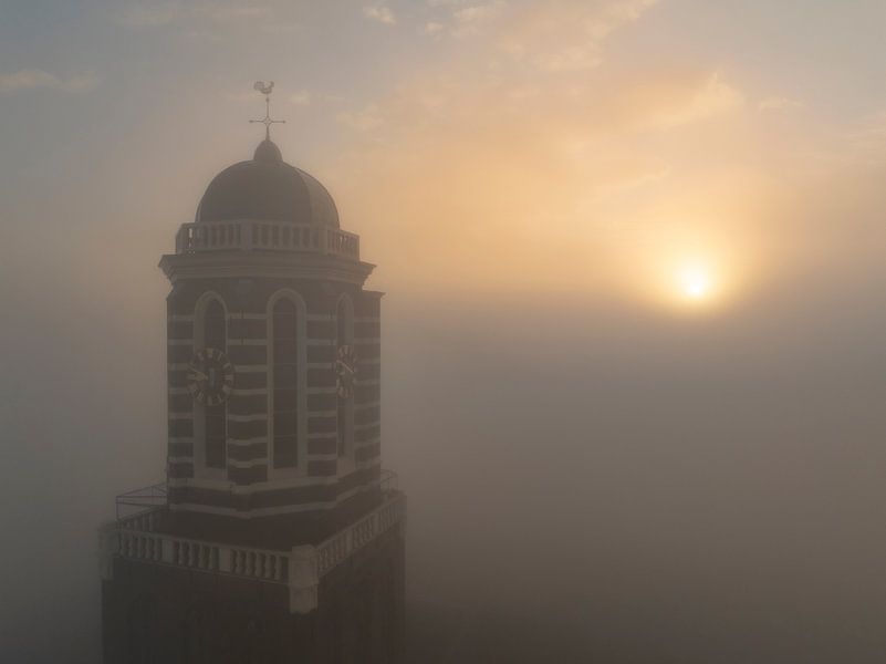 Peperbus church tower in Zwolle above the mist  by Sjoerd van der Wal Photography