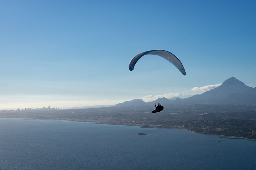 Paragliding over the blue Mediterranean Sea by Adriana Mueller
