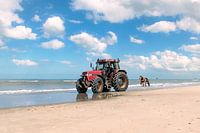 The tractor is his office, the island his life