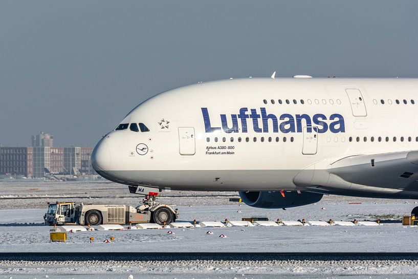 A large Lufthansa Airbus A380 named &quot;Frank am Main&quot; is towed to the terminal for i by Jaap van den Berg
