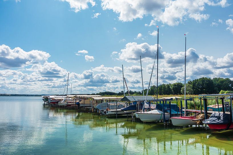Boats on a lake in Roepersdorf, Germany by Rico Ködder
