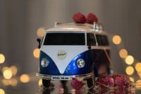 VW van with bokeh and flowers