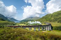 Jacobite steam train passes Glenfinnan viaduct