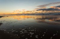 zonsondergang aan zee