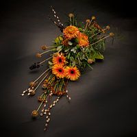 Bright and colourful floral arrangement against dark background