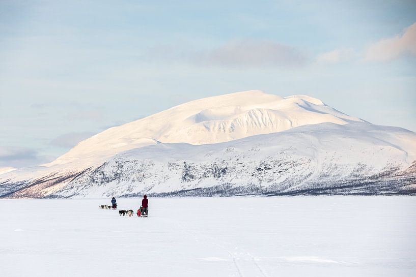 Snowy peak during husky sleigh ride by Martijn Smeets