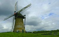 Old mill in a natural landscape with primitive Dutch weather