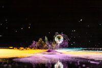 Op spattende knikker