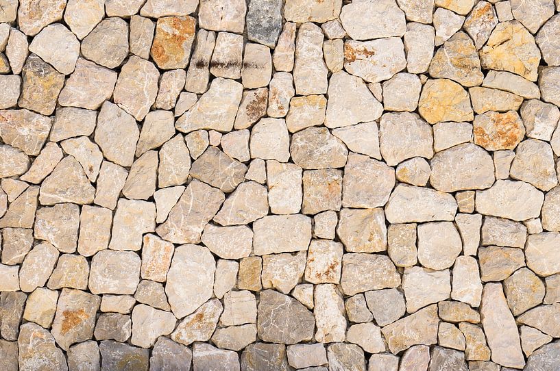 Texture de fond d'un mur de pierre, structure en gros plan par Alex Winter