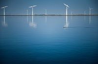Dutch windmills at blue water photo print