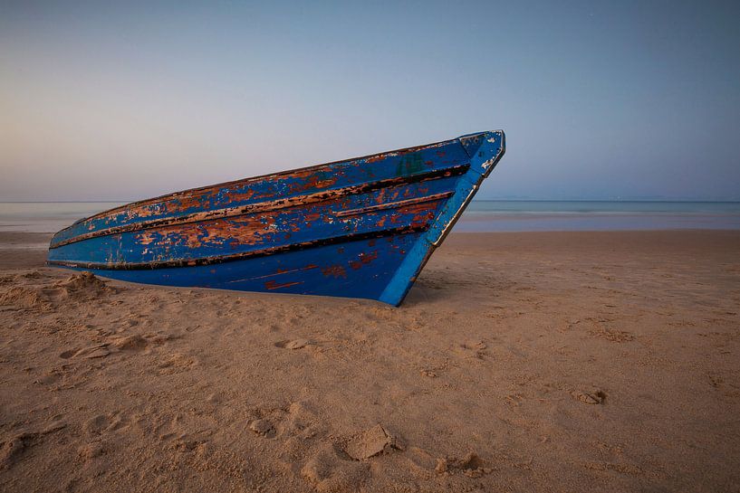 Old boat on the beach by Frank Herrmann