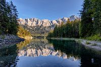 The Zugspitze massif is reflected in the Eibsee