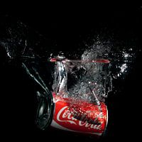 Blikje Cola in water