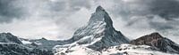 Panoramic view Matterhorn in front of cloudy sky