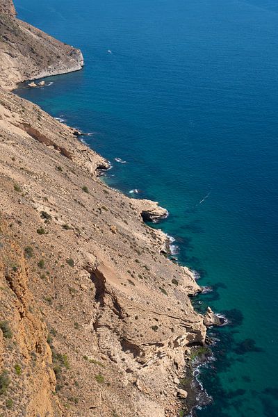 Cliffs jut out into the blue Mediterranean by Adriana Mueller