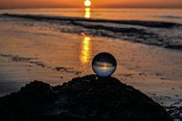 Sunset in glass sphere