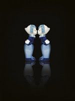 Love. Delft blue pillow pair, women. On black background