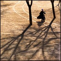 Little girl on a scooter on a winter's morning