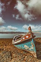 Rustic Old and Weathered Boat in Enchanting Seixal Bay Amid Portugal Coastal Seascape