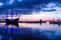 VOC ship the Halve Maen before sunrise in the port of Volendam
