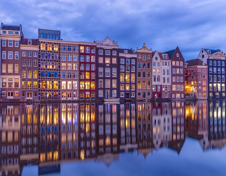 Amsterdam houses along the Damrak canal by Rene Siebring