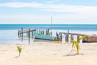 A boat at a pier on Caye Caulker in Belize
