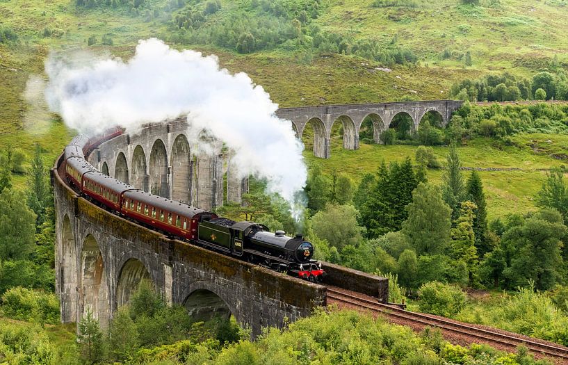 Historic steam train 'The Jacobite' on the Glenfinnan Viaduct by Christian Müringer