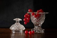 Red berries in a jam jar