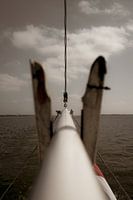 Pulley through the middle of the picture.