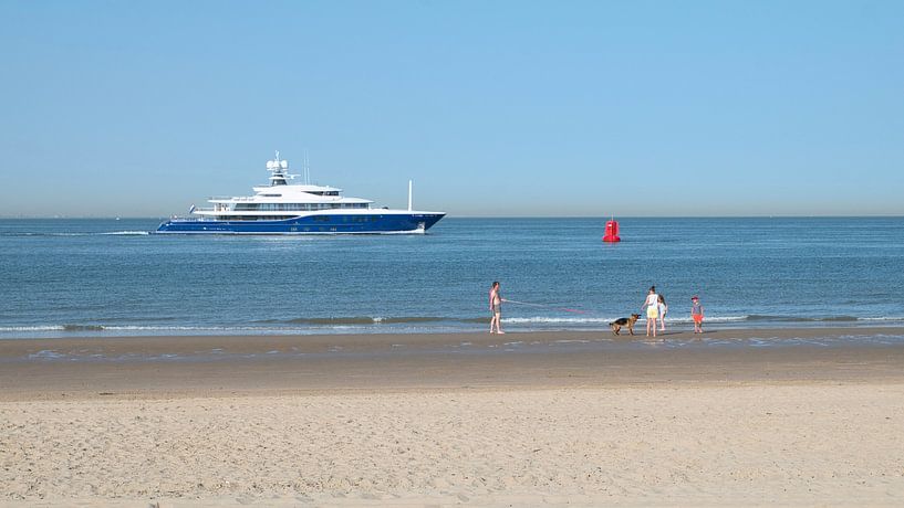 A blue yacht sails the Westerschelde by Tom Haak