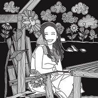 Little girl with sunflowers in the garden