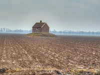 A barn in the middle of the fields