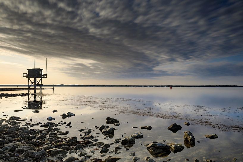 beautiful sunset behind a fisherman's house at the waterfront in Scharendijke in the province of Zee by gaps photography