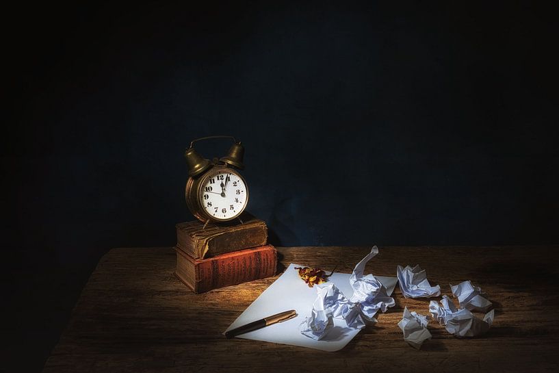 Still life with humor,antique alarm clock and books.Offered. by Saskia Dingemans Awarded Photographer