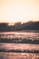 Sonnenuntergang hinter den Wellen