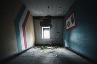 Verlassener urbex Raum mit verblassenden Farben- Urban Exploring Fotografie