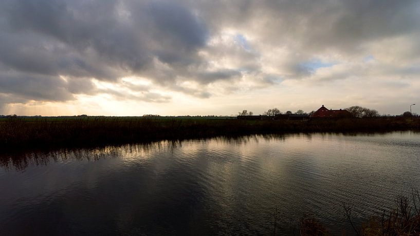 Silhouette of the Holendrecht river bank during the winter. by Robrecht Kruft