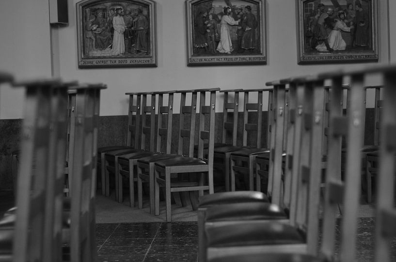 Church chairs in a church. by Kim De Sutter