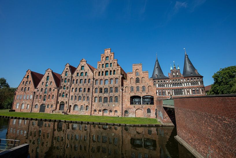 Warehouses in the old town of Lübeck in Germany by Joost Adriaanse