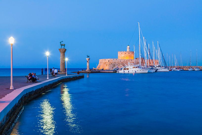 Mandraki Port at Rhodes Island in Greece at night by Werner Dieterich