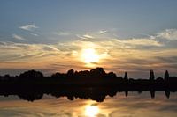 Zonsondergang op de rivier