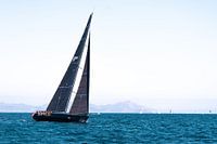 Black sailing yacht during Voile de St Tropez