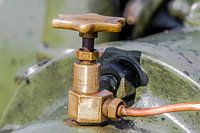 Geel koperen kraantje