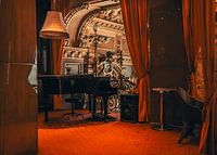The slightly worn piano bar at the beautiful New York Café, Budapest.