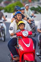 Father with son on a motorbike