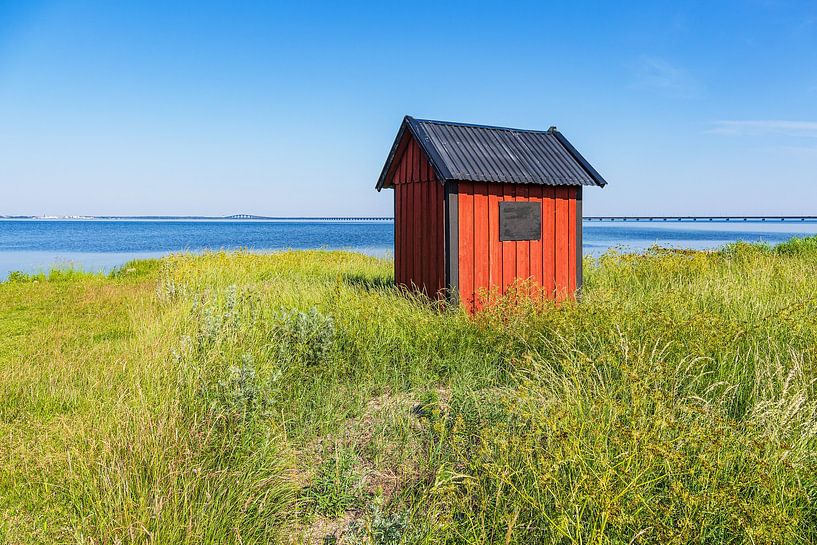 Cabane en bois rouge à Färjestaden sur l'île d'Öland en Suède par Rico Ködder