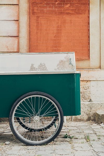 Green Cart for Orange Wall by Patrycja Polechonska