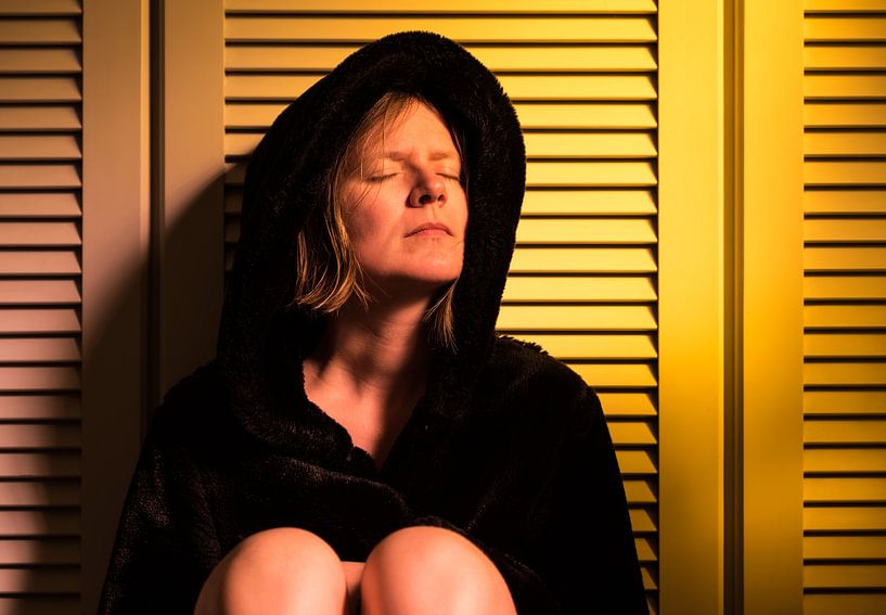 Portrait of a thirty year old attractive woman in a bedroom with by Werner Lerooy