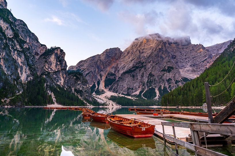 Wooden boats line the shoreline of Pragser Wildsee, Braies Lake, in the stunning Dolomites of South Tyrol, Italy von Thilo Wagner