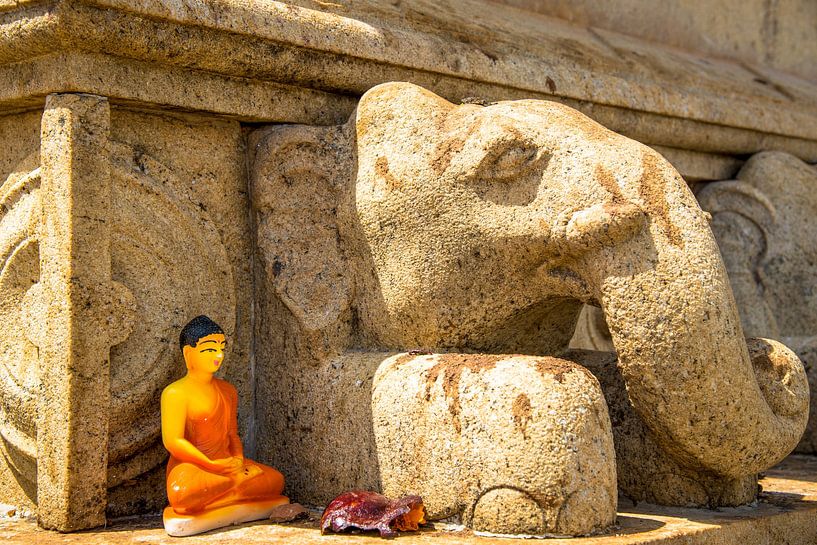 small Buddha statue at foot of Buddhist temple, Anuradhapura, Sri by Jan Fritz